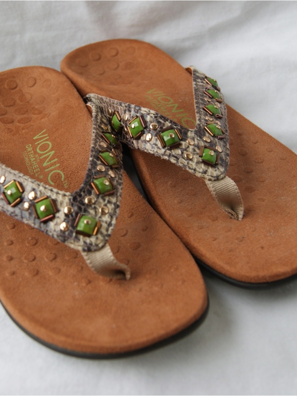Vionic Women's Tan Snake-Print Flip Flops with Green Gem Accents